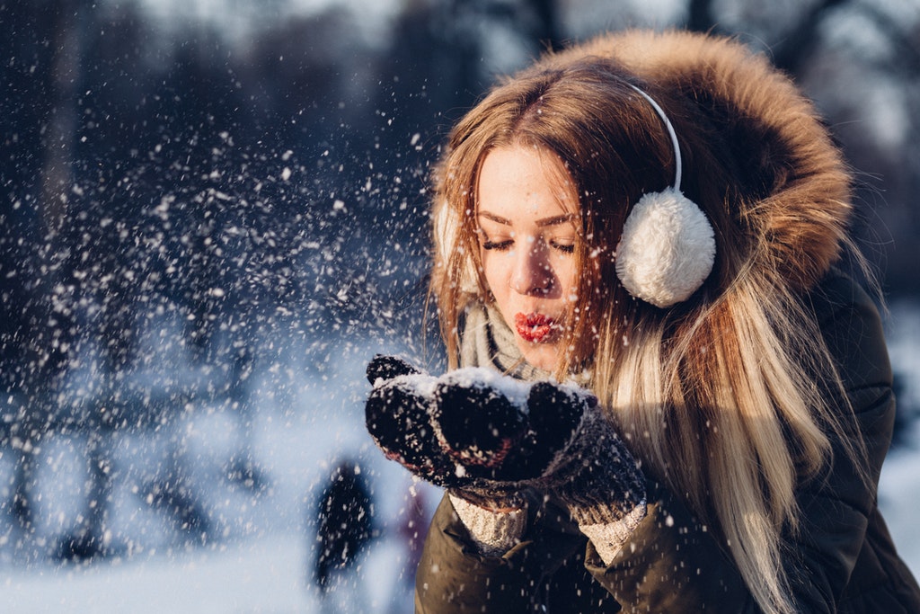 Girl playing with snow | Winter RV Parking